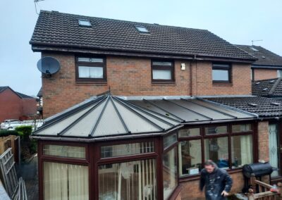 Old glass conservatory roof before a solid roof conversion