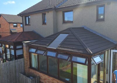 Conservatory with new solid roof and fascias