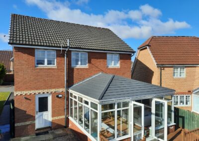 Solid conservatory roof on a modern house