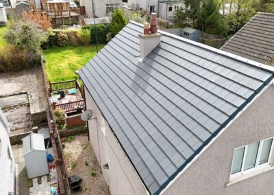 Bungalow after a full re-roof with grey tiles