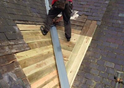 New battens being fitted during a re-roof