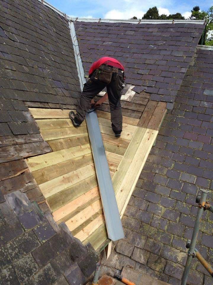 New battens being fitted during a re-roof