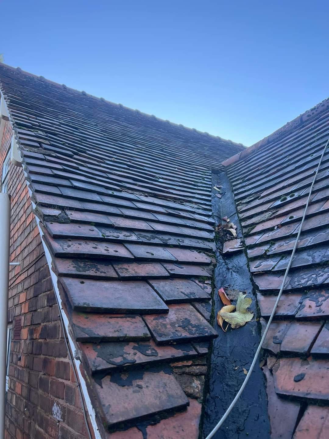 Valley on a tiled roof after repair