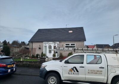 Kerse Roofing & Building van outside a job