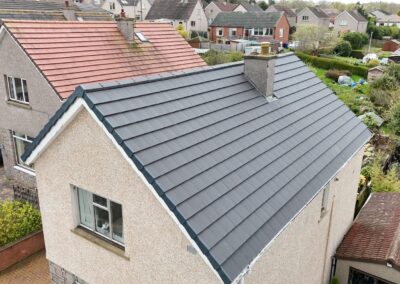 House with a new grey tiled roof