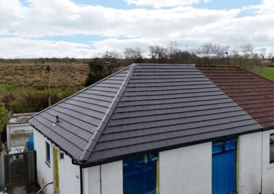 Hipped bungalow roof after re-roofing