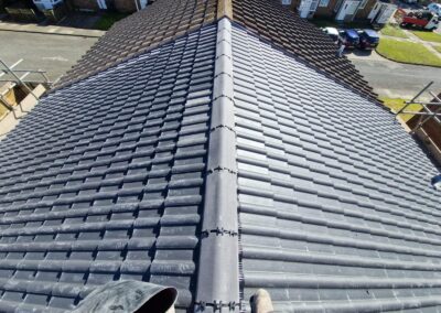 New grey tiled roof after a full re-roof