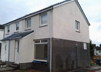 Two-tone roughcast finish on a house